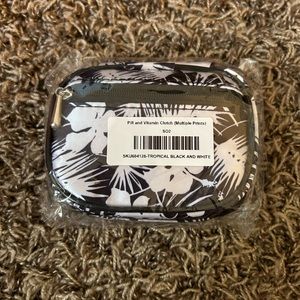Tropical Black Pill & Vitamin Clutch